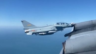 Photo of Canadian patrol aircraft intercepted by Chinese fighter jet