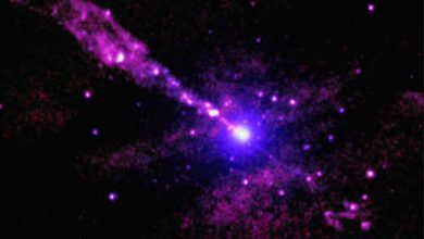 Photo of Chandra sees black hole jet stumble into something in the dark
