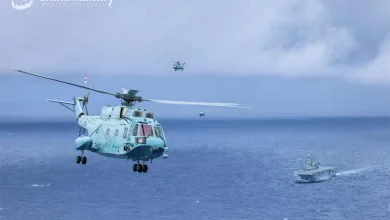 Photo of China’s naval flotilla conducts amphibious drills in disputed waters
